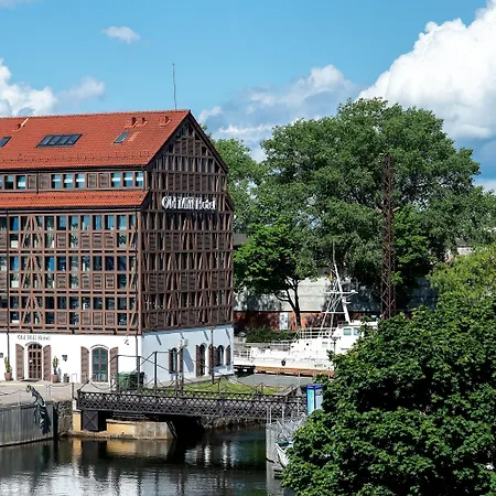 老磨坊酒店 酒店